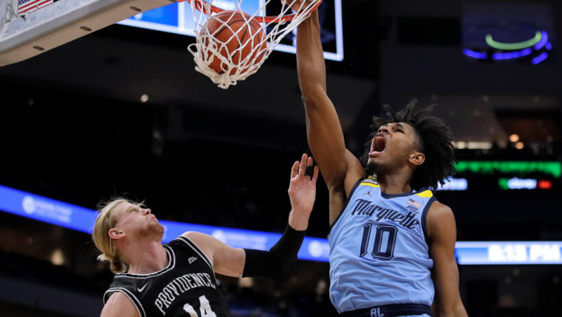 Marquette's Justin Lewis dunking against Providence