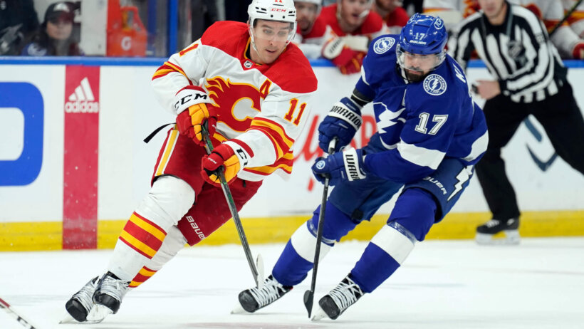 Calgary Flames center Mikael Backlund carries the puck down the ice