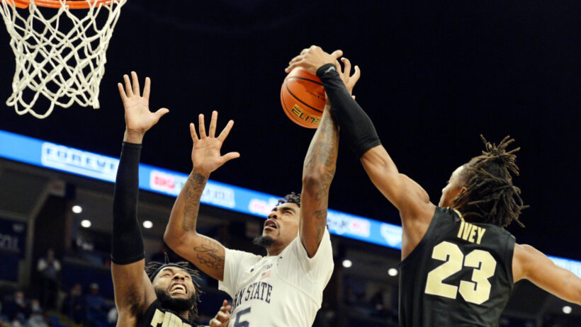 Purdue's Trevion Williams blocking a shot against Penn State
