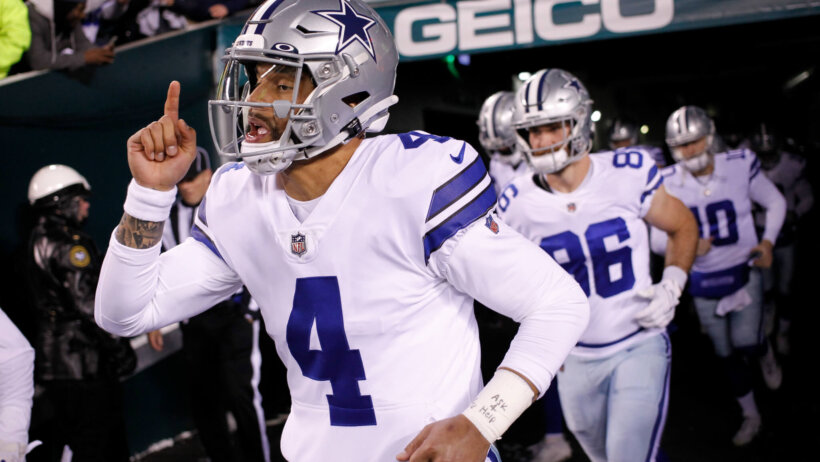 Dak Prescott running onto field