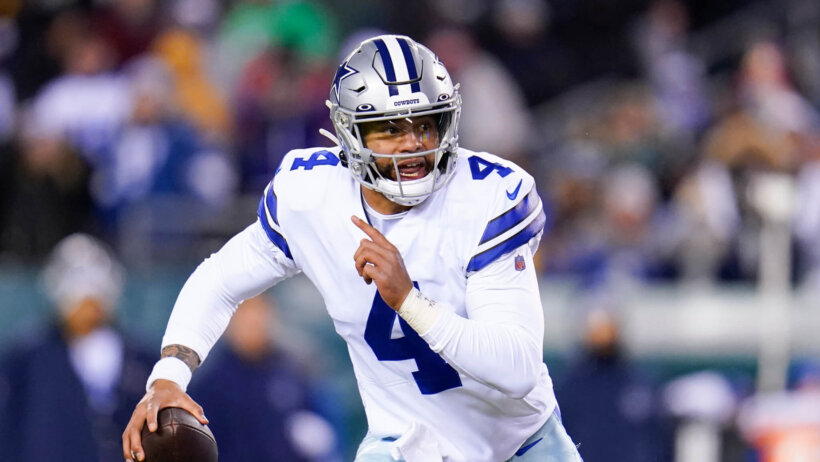 Dak Prescott scrambles out of the pocket