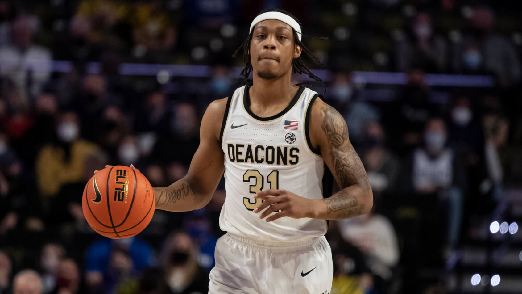 Wake Forest guard Alondes Williams dribbling the ball up the court