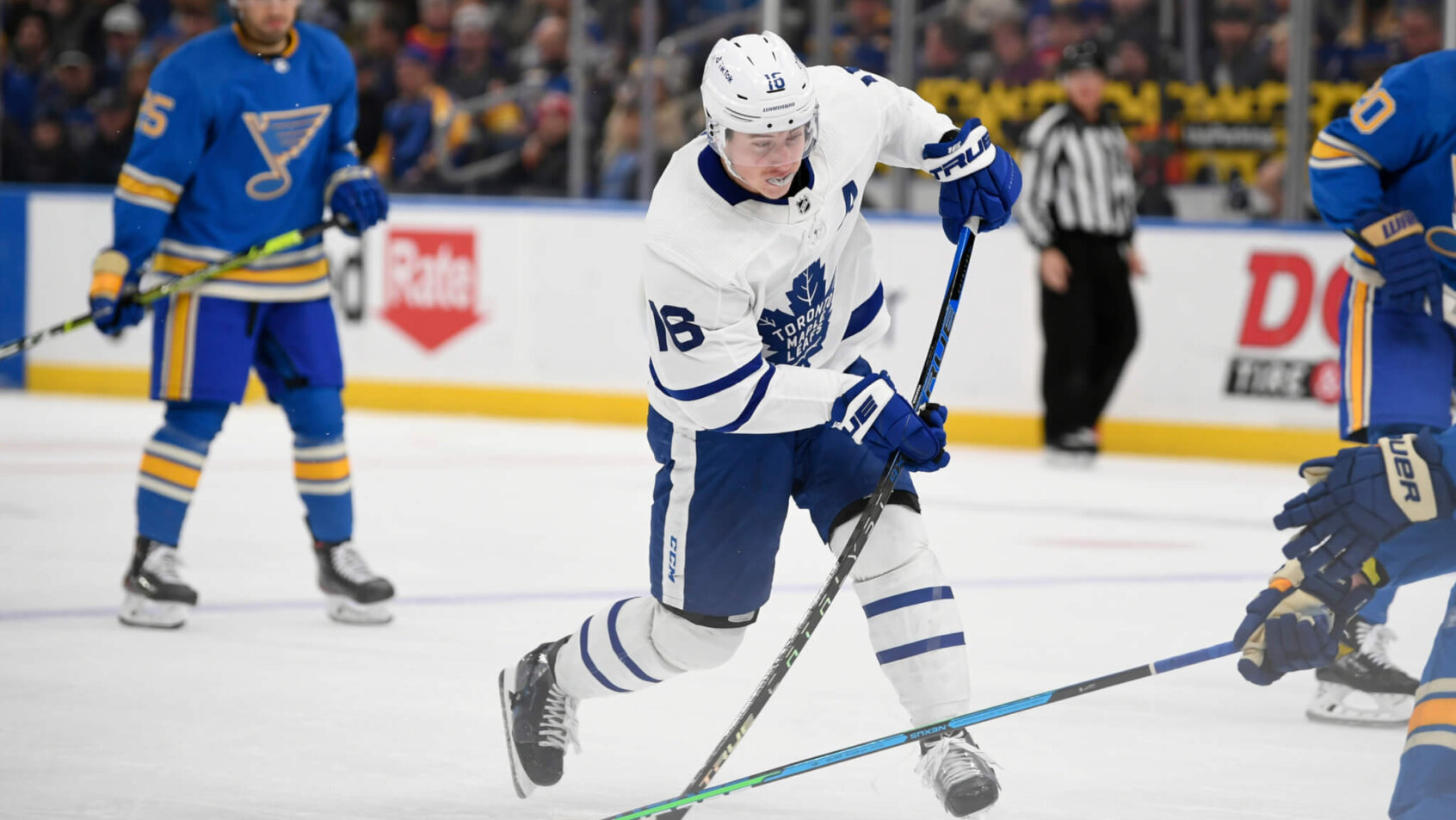 Mitch Marner shoots puck