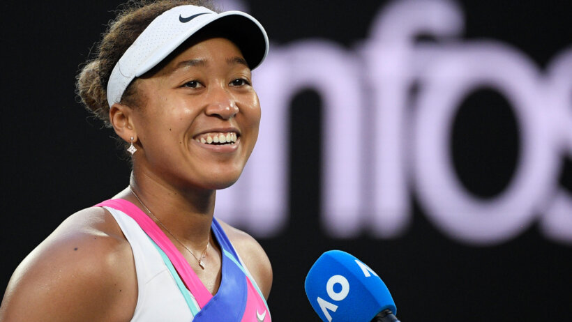 Naomi Osaka being interviewed after winning a tennis match.