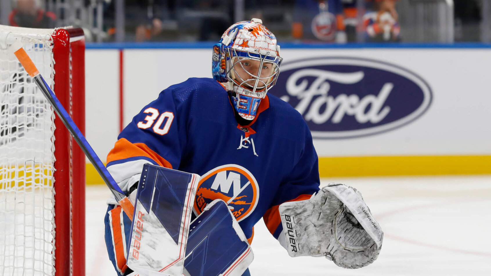 New York Islanders goaltender Ilya Sorokin preparing in front of the net prior to a game.