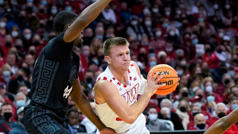 Wisconsin's Brad Davison driving past a defender