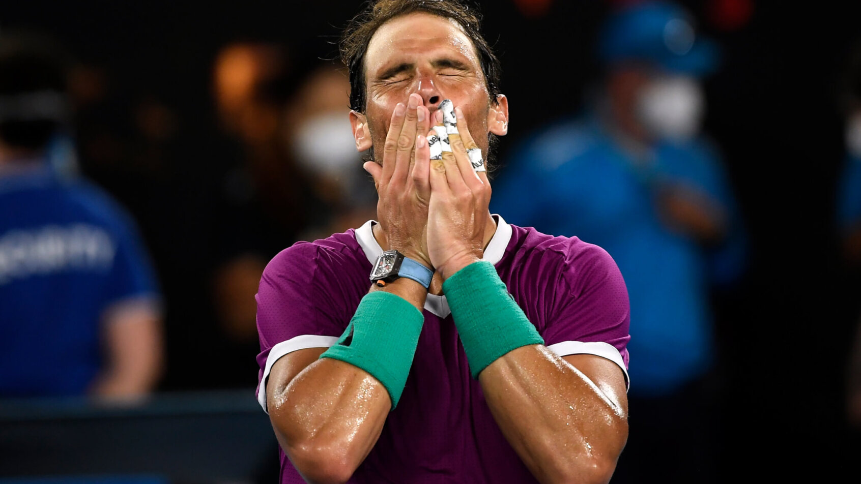 Rafael Nadal hands covering mouth reaction after win