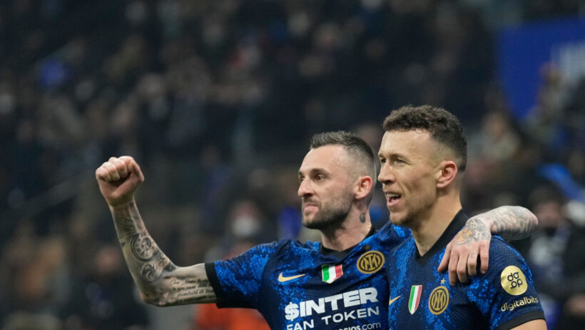 Inter Milan's Ivan Perisic celebrates with Marcelo Brozovic