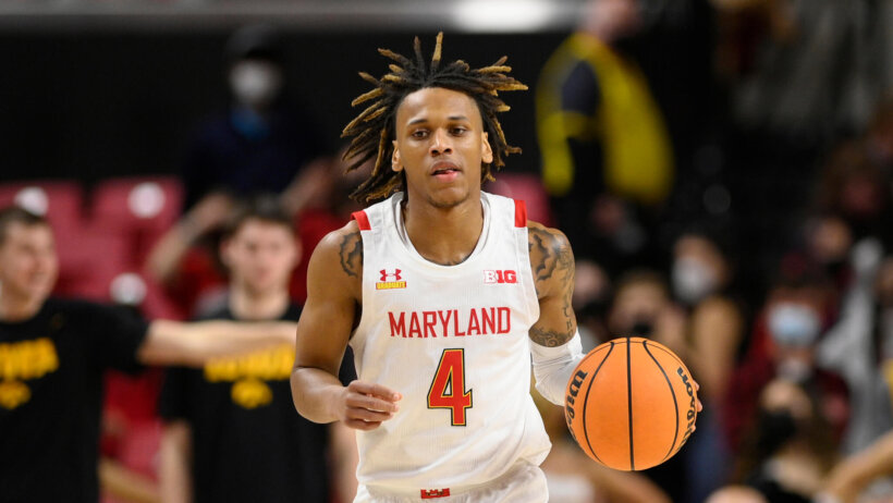 Maryland guard Fatts Russell dribbling the ball up the court