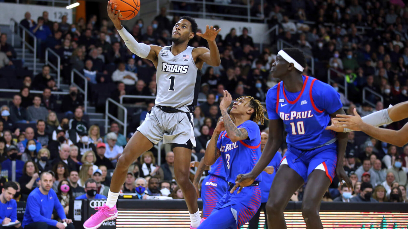 Providence's Al Durham scoring a layup