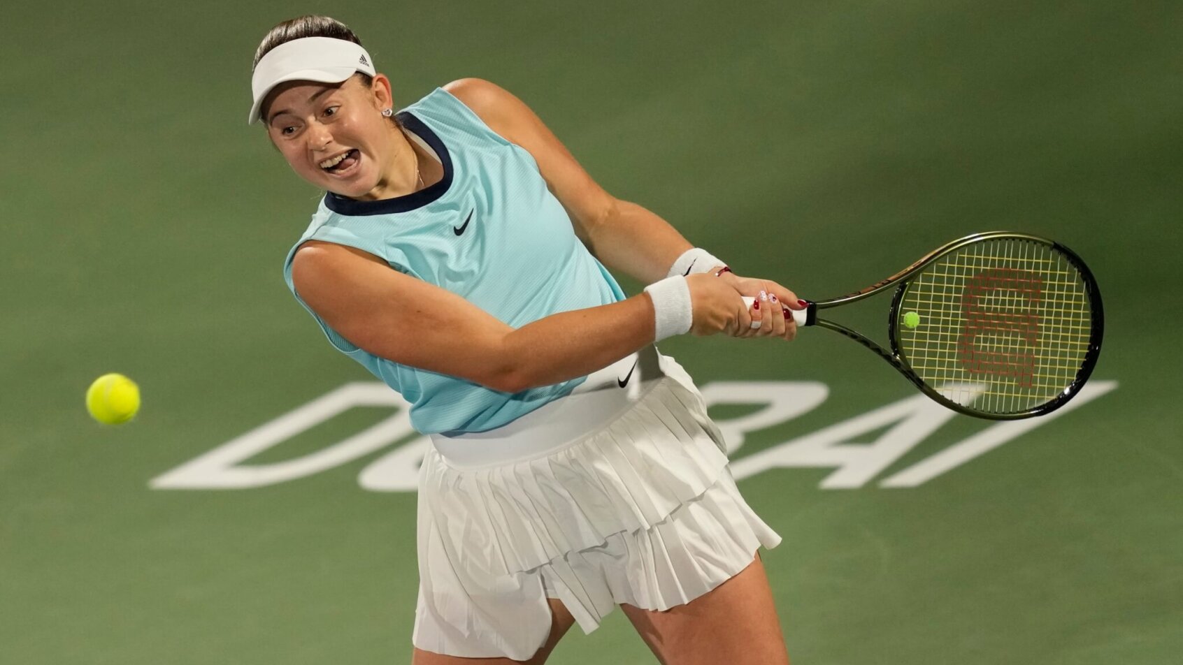 Jelena Ostapenko about to hit backhand