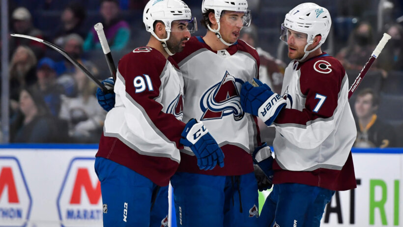 Avalanche players celebrate goal