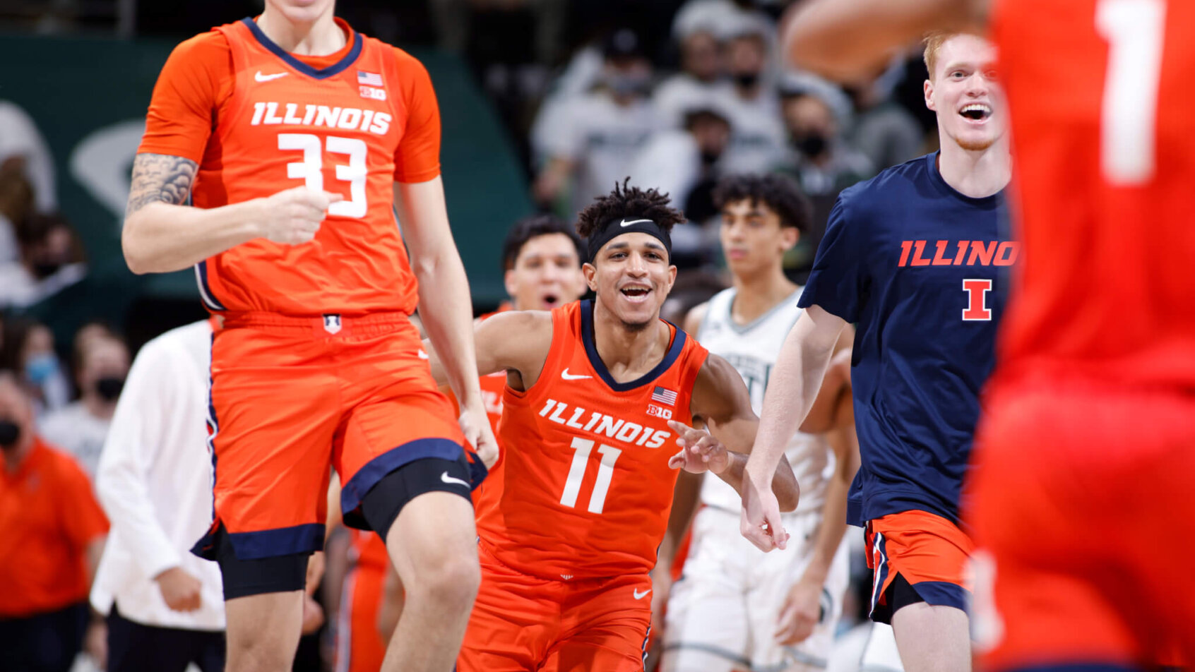 Illinois players celebrating a win over Michigan State