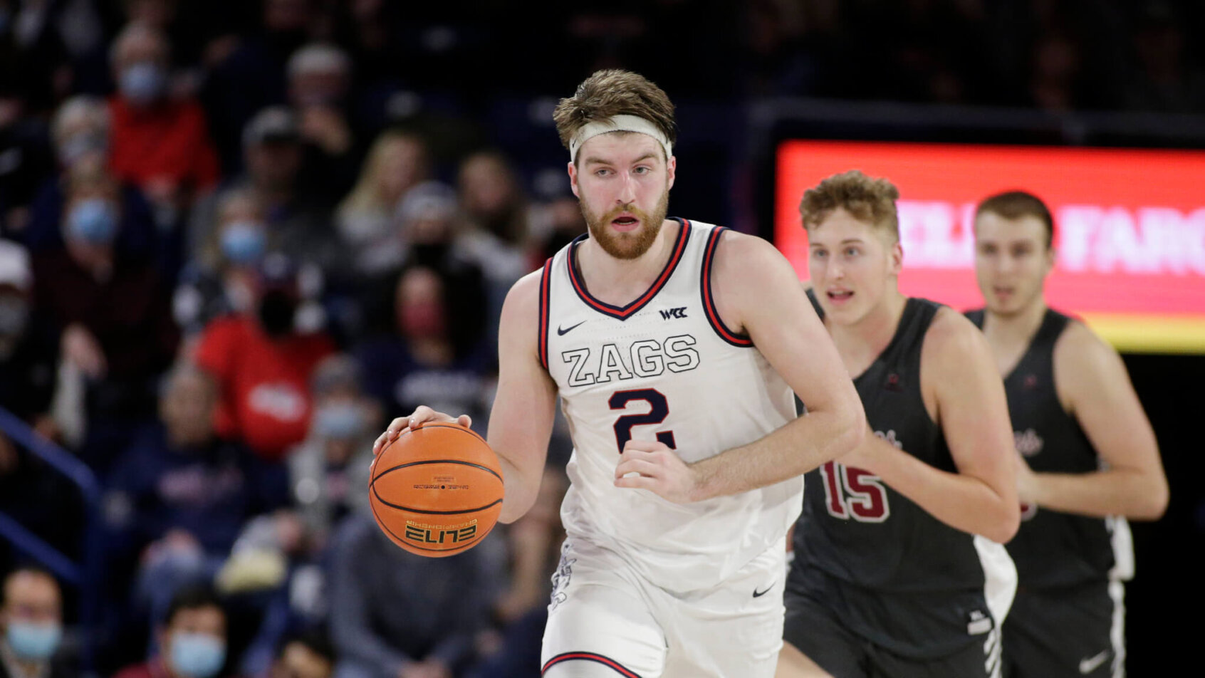 Gonzaga forward Drew Timme dribbling up the floor