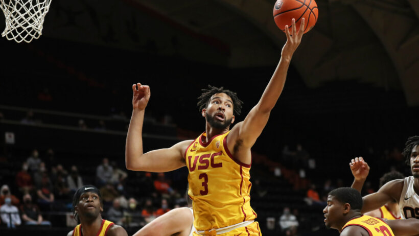 Southern California forward Isaiah Mobley collects a rebound