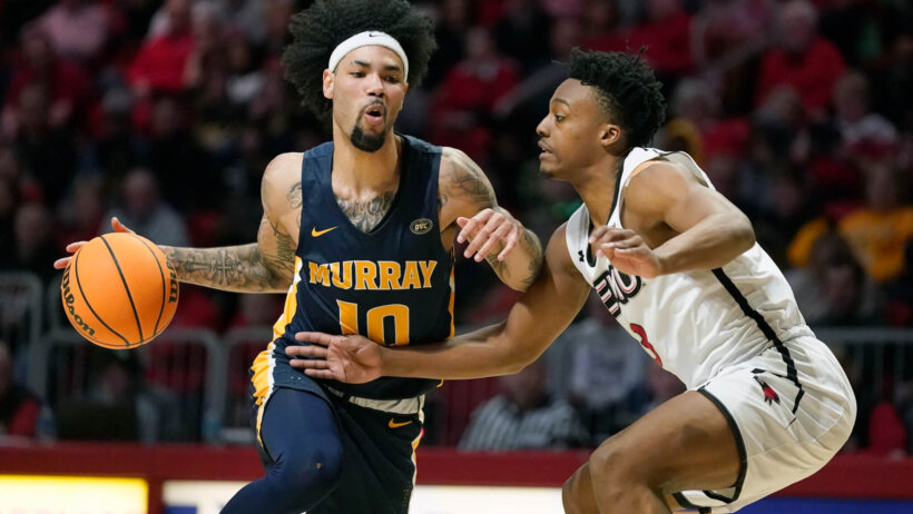 Murray State's Tevin Brown driving past a defender