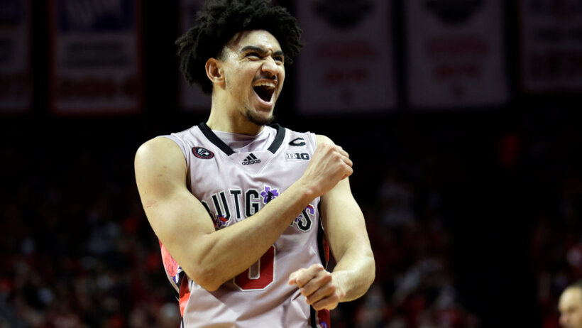 Rutgers guard Geo Baker celebrating a basket