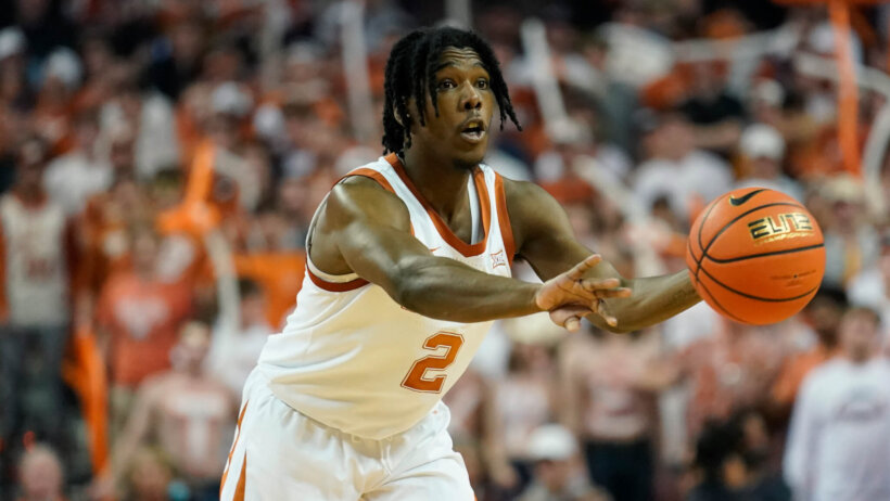 Marcus Carr passing basketball