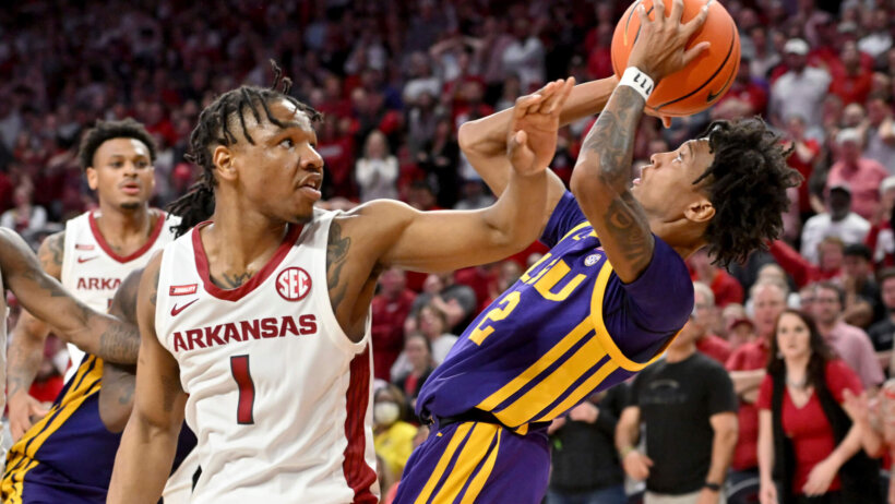 Arkansas guard JD Notae defending against LSU