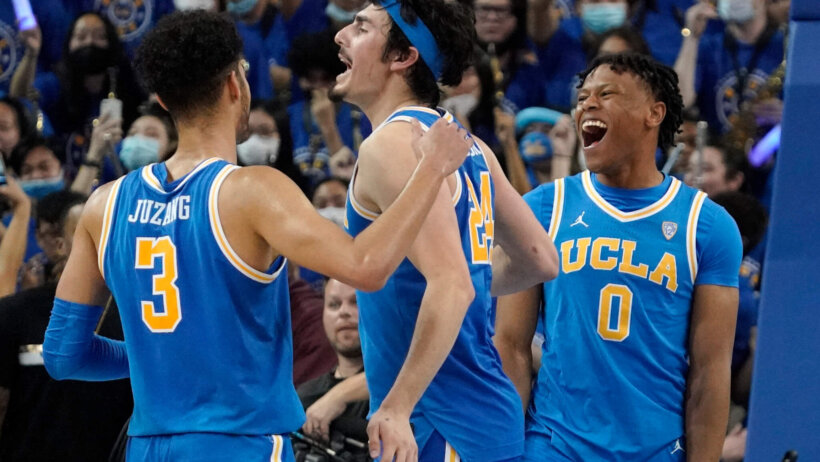 UCLA guard Jaime Jaquez Jr celebrating a win with teammates