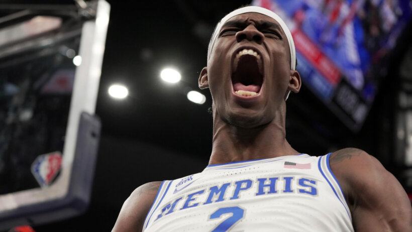 Memphis' Jalen Duren yelling in celebration after a dunk