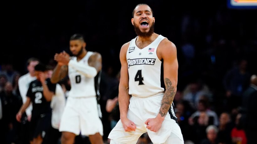 Providence's Jared Bynum celebrating a win