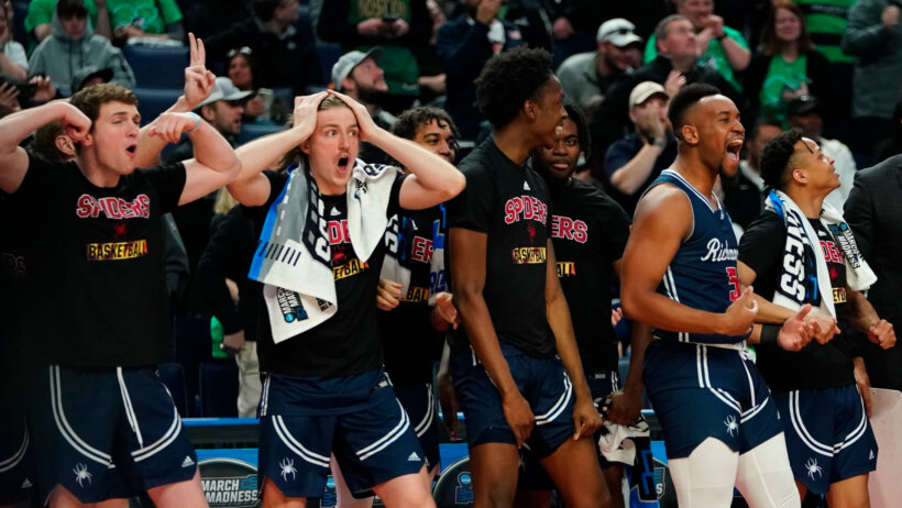 Richmond's Nick Sherod celebrating with his Spider teammates
