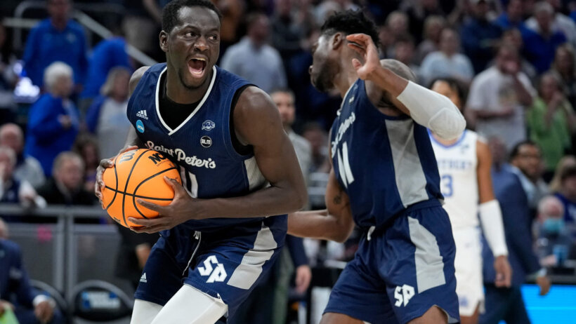 Saint Peter's forward Hassan Drame celebrating his team's win over Kentucky