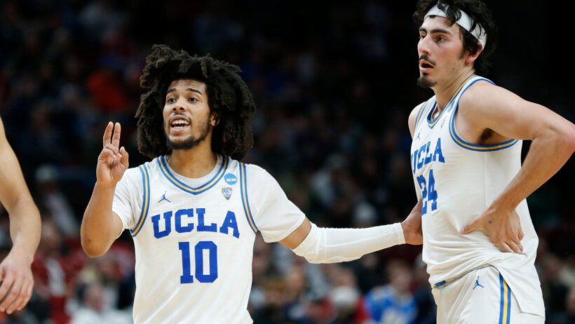 UCLA's Tyger Campbell talking to teammate Jaime Jaquez Jr