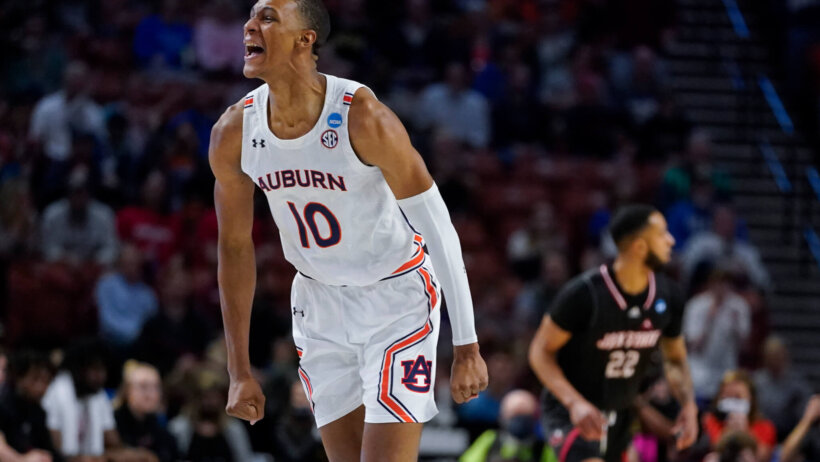 Jabari Smith celebrates after a bucket
