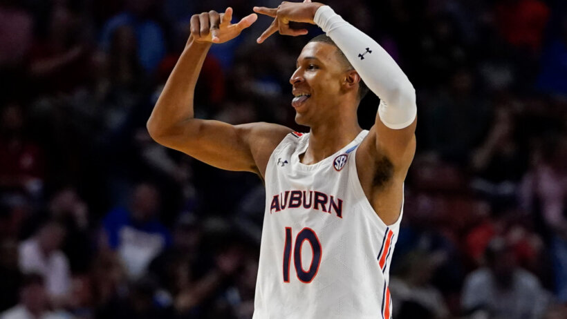 Jabari Smith celebrates following a bucket