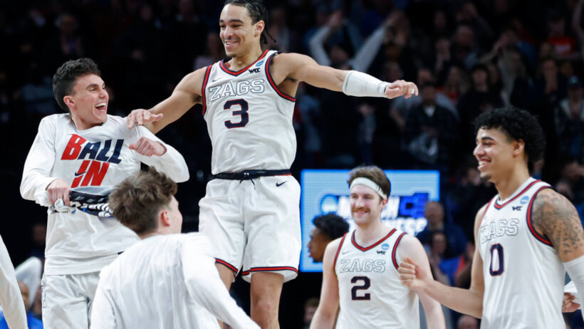 Andrew Nembhard celebrates with his Gonzaga teammates
