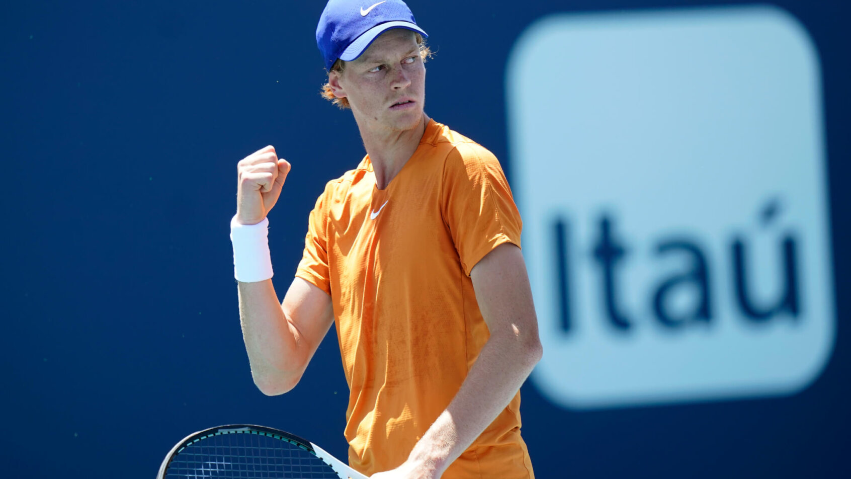Jannik Sinner fist pumping during a tennis match at the Monte-Carlo Masters.
