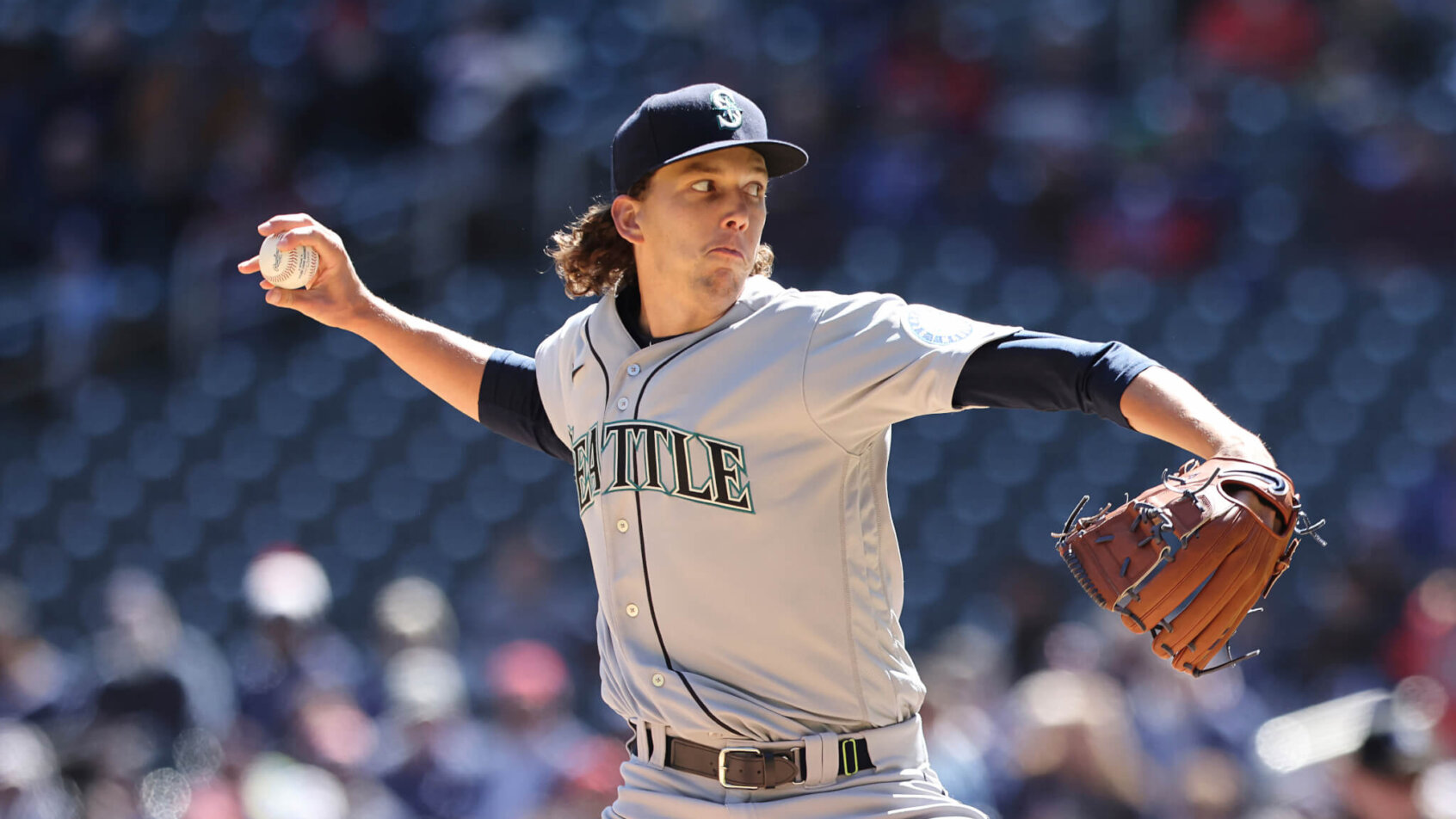 Seattle Mariners starting pitcher Logan Gilbert mid-pitch