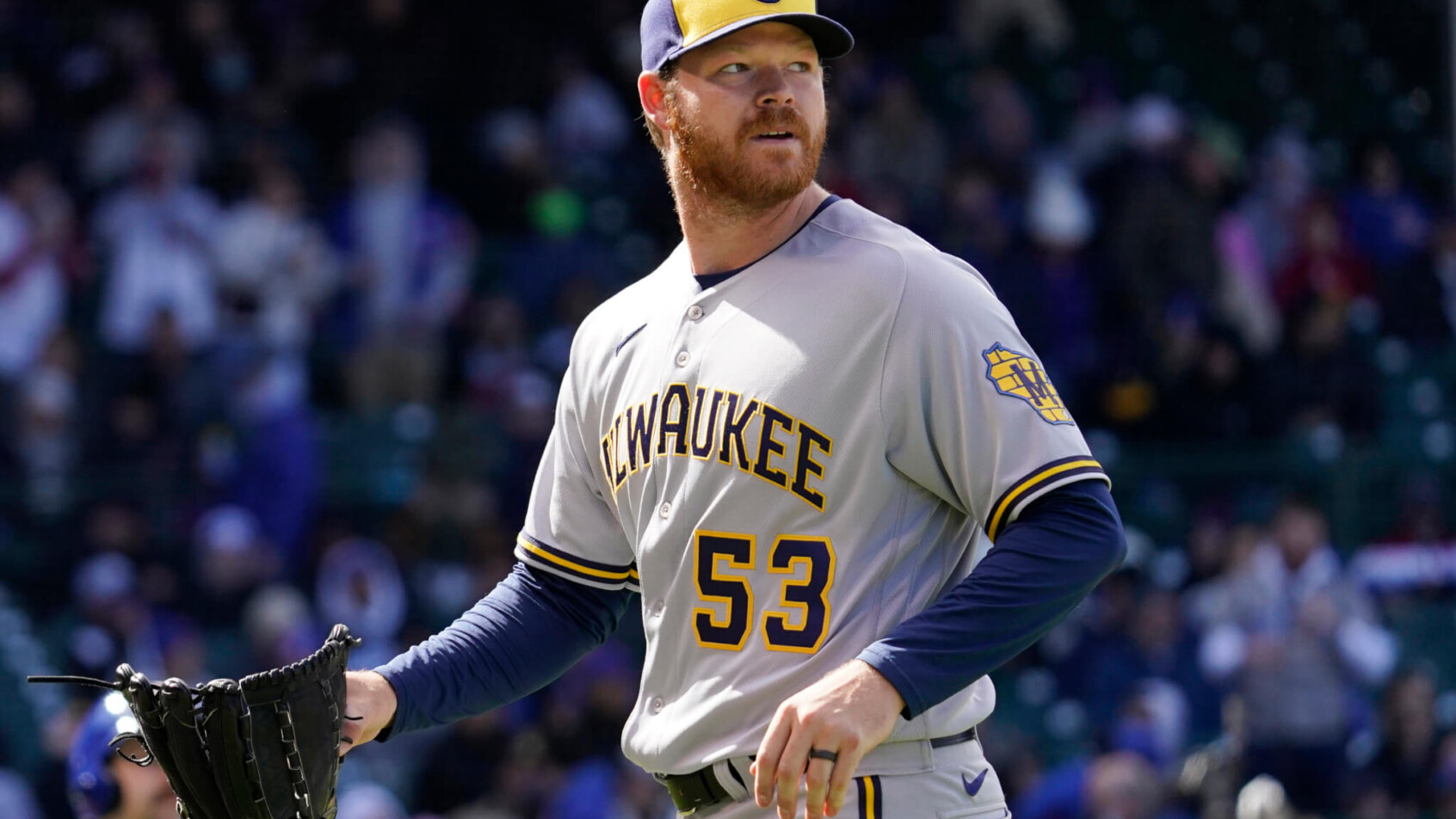 Milwaukee Brewers starting pitcher Brandon Woodruff walking off the mound