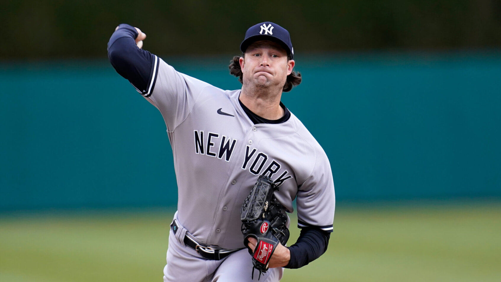 New York Yankees pitcher Gerrit Cole throwing a pitch during a game.