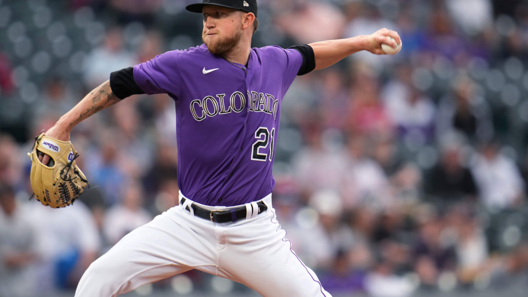 Colorado Rockies starting pitcher Kyle Freeland throwing a pitch