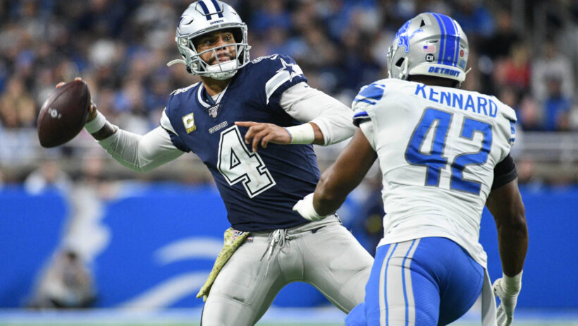 Dak Prescott throws a pass versus the Lions