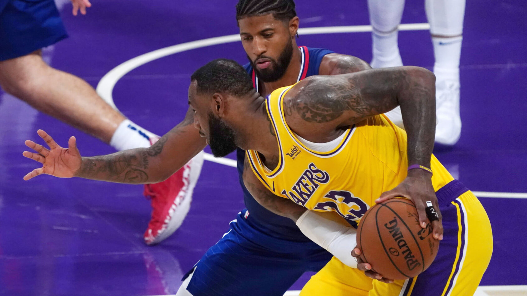 Paul George defending LeBron James