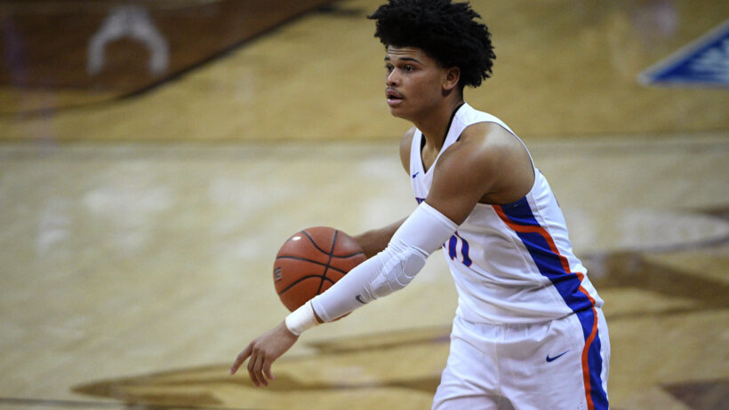 Boise State Broncos guard RayJ Dennis dribbling