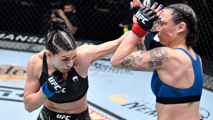 Mackenzie Dern punching Nina Nunes in the face