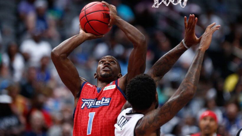 Joe Johnson shoots over defender