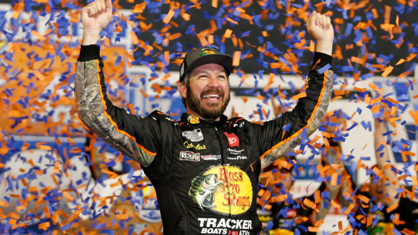 Martin Truex Jr celebrating a NASCAR victory