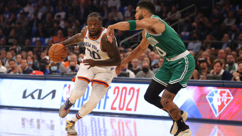 Julius Randle driving to hoop, defended by Jayson Tatum