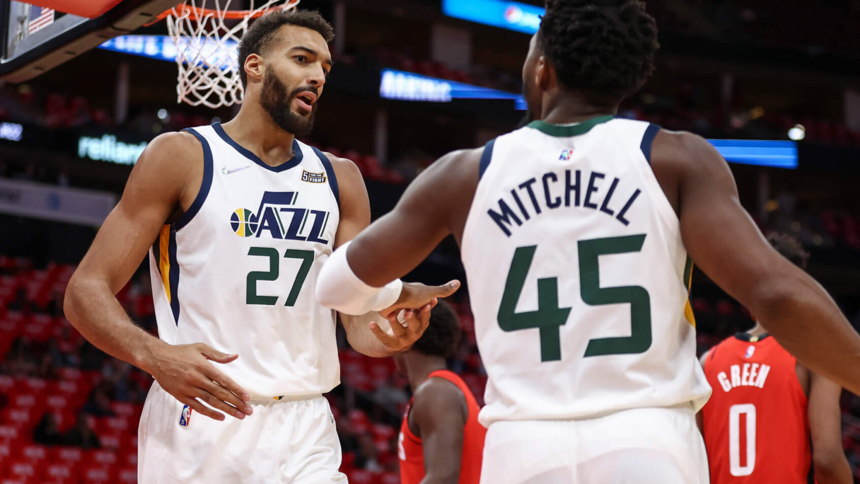 Gobert and Mitchell embrace