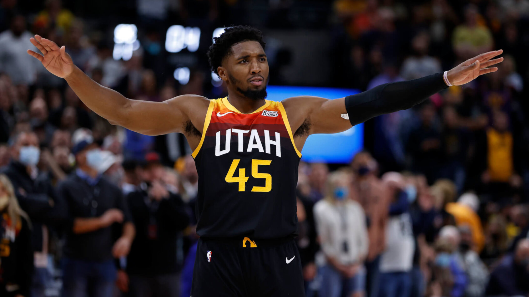 Donovan Mitchell arms out