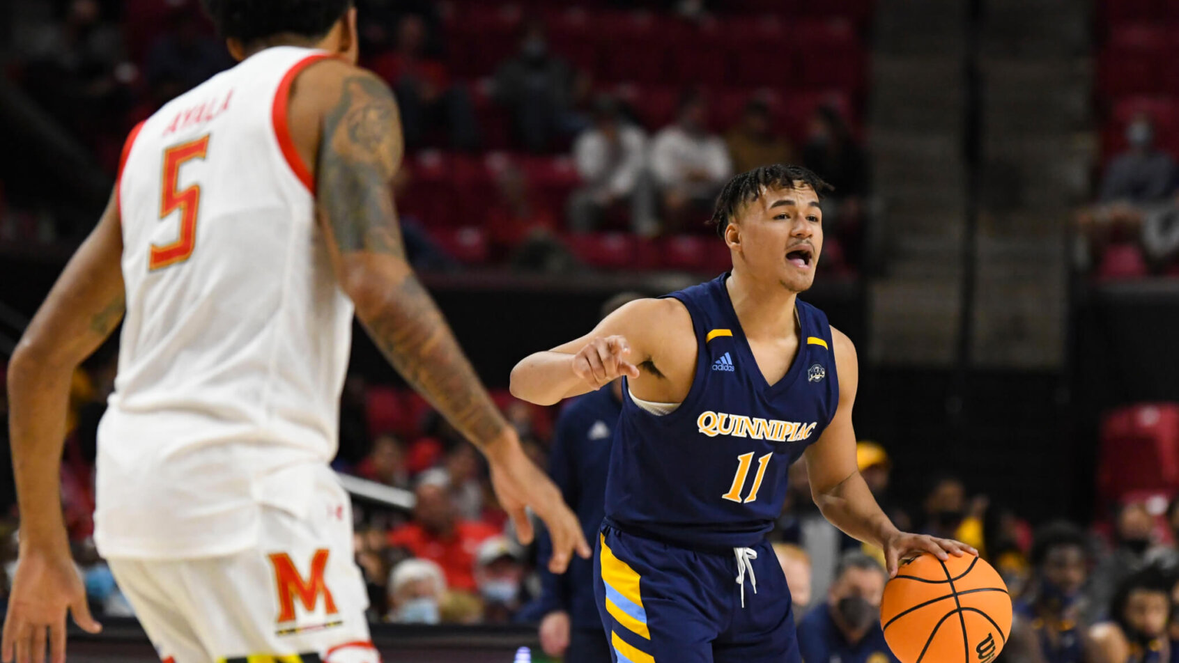 Quinnipiac Bobcats guard Dezi Jones dribbling