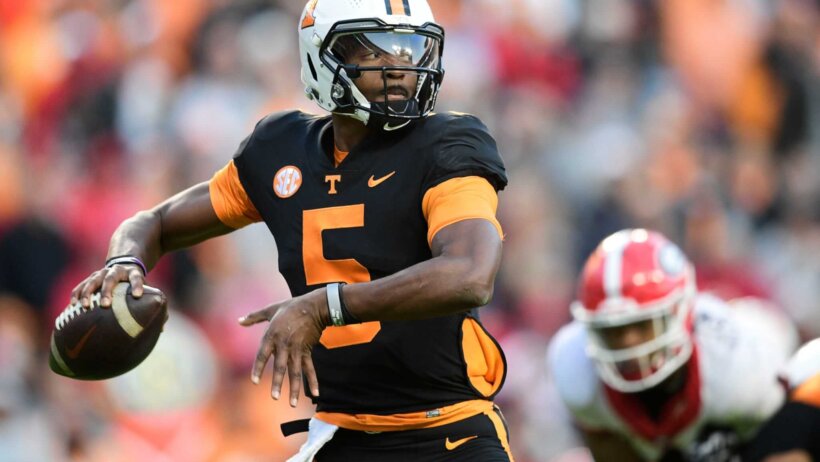 Tennessee quarterback Hendon Hooker lines up a pass during an SEC football game vs Georgia