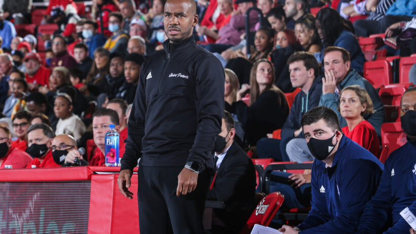 St. Peter’s Peacocks head coach Shaheen Holloway on his team's sideline
