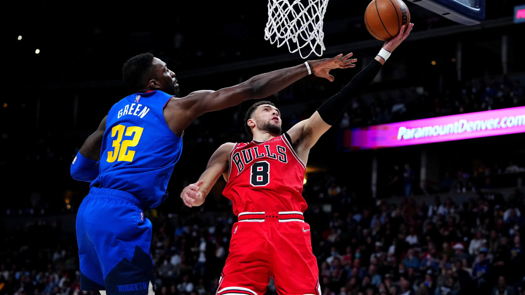 Zach LaVine laying the ball in over defender